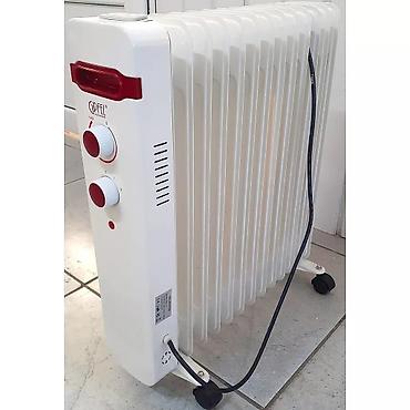 Масляные обогреватели: Масляный обогреватель Кол-во секций: 7, Быстрый нагрев, Встроенный вентилятор, Несколько режимов мощности — 12