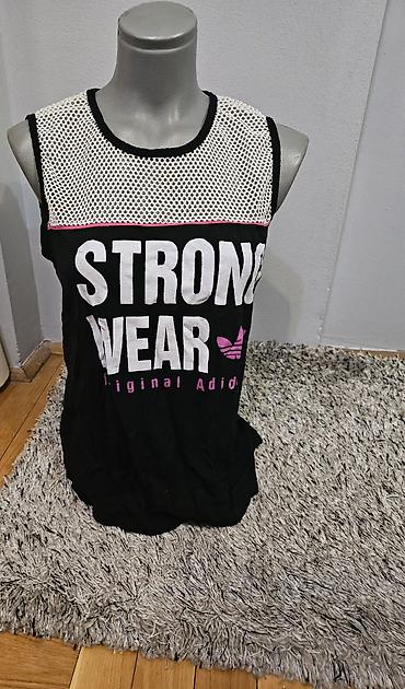 eb studio obuca: Ženska sportska majica bez rukava „STRONG WEAR“.
S/M vel — 1