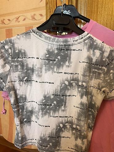 ağ futbolka: Qadın t-shirt - Model: Qısaqol, dairəvi yaxalı 💰 Qiymət: 5 manat — 2