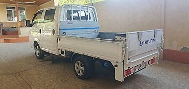 hummer h3: Hyundai Porter II, двухкабинный бортовой грузовик. Практичный — 4
