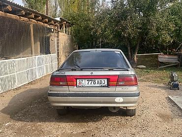 опель вектора с: Mazda 626: 1990 г., 2 л, Механика, Бензин — 4