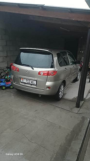 е60 e60: Mazda Demio: 2006 г., 1.5 л, Автомат, Бензин, Хэтчбэк — 2