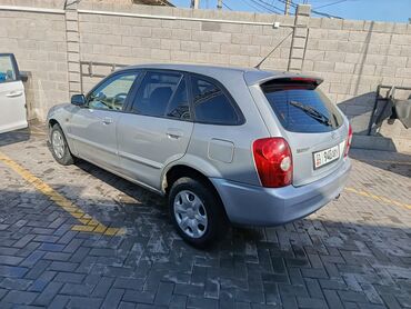 продаю в связи с переездом: Mazda 323: 2003 г., 1.6 л, Механика, Бензин, Хэтчбэк
