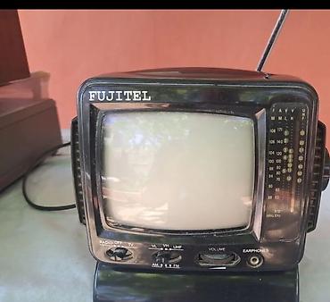 TV və video: - Kompakt, stolüstü korpus və daxili teleskopik antenna - Qara-ağ — 1