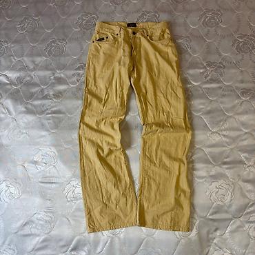 yeni model koftalar: Açıq sarı rəngli kişi şalvarı - Model: 5 ciblə klassik denim kəsimi — 2