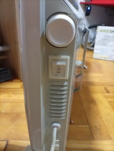 Kaloriferi: Električni konvektor Ballu. oko 84 48 sa zidnim nosačem. 1000 w i — 6