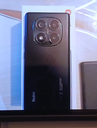 redmi 15 pro qiyməti: Xiaomi Redmi smartfon - Marka/seriya: Redmi (Xiaomi) - Rəng: Qara - — 1