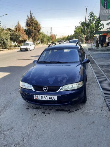 опел вектра бишкек: Opel Vectra Caravan (универсал), темно‑синий цвет. Основные