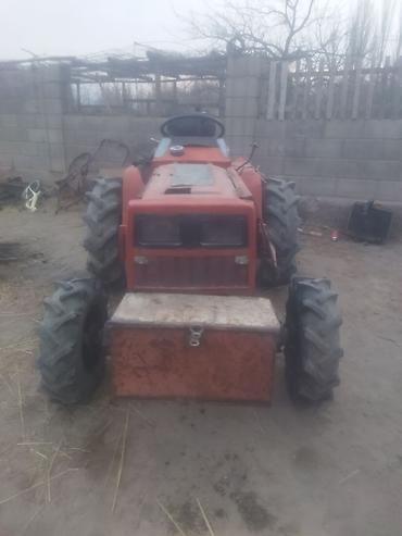 Другие мини-тракторы: Компактный колесный тракт (мини-трактор) красного цвета. Основные — 1