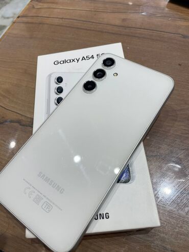 samsung 6: Samsung Galaxy A54 5G, 128 ГБ, цвет - Белый, Гарантия, Отпечаток пальца, Беспроводная зарядка