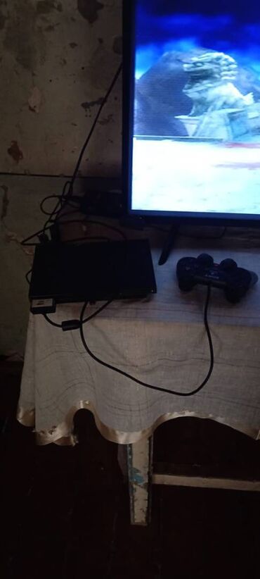 austin montego 2 mt: PlayStation 2. 10 oyun. 1 pult. 40 azn