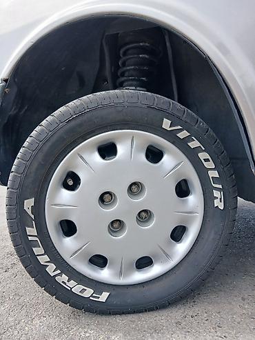 Şin və təkərlər: İşlənmiş Şin Formula 215 / 50 / R 13 — 4