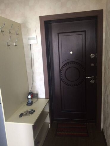 Uzunmüddətli kirayə mənzillər: Nərimanov metrosuna yaxin 14 mertebeli binanın 7-ci mərtəbəsində — 11