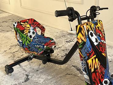 Детский электрический дрифт‑кар (drift trike) с ярким