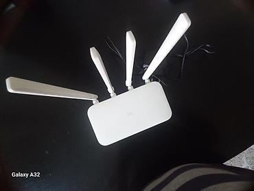 Modemlər və şəbəkə avadanlıqları: Xiaomi Mi Wi‑Fi Router (4 antennali) + TP‑Link ADSL/VDSL modem-router — 3