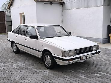 mini gps tracker: Toyota Camry: 1984 г., 2 л, Автомат, Бензин — 7