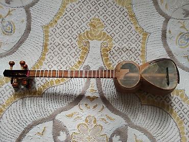 Tar: Tar – xalq musiqi aləti - Korpus: ikili çanaqlı, bərk ağacdan (əl — 1