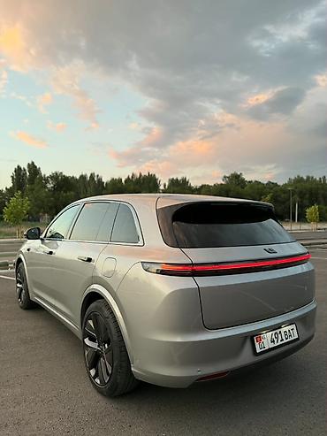 kaiyi e5: Lixiang L7: 2023 г., 1.5 л, Автомат, Гибрид, Внедорожник — 3