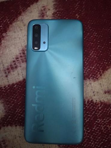 a 20 s: Redmi 9T, 64 GB, rəng - Mavi — 1