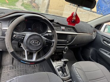 арзан авто машина: Салон автомобиля Kia, оборудованный автоматической коробкой передач
