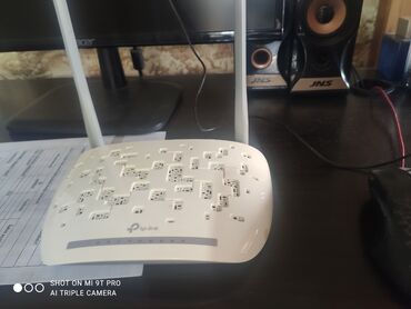 Modemlər və şəbəkə avadanlıqları: TP-Link simsiz N ADSL2+ modem routeri. Evdə və ya ofisdə internetə