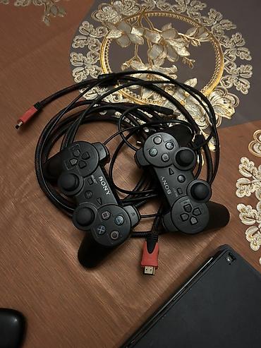 ps 3 cd: Məhsul: Sony PlayStation 3 (PS3) Slim oyun konsolu + aksesuarlar — 1