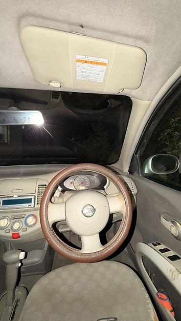 кербен авто: Nissan Micra: 2003 г., 1.3 л, Автомат, Бензин, Хэтчбэк — 8