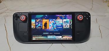 купить стим дек: Valve Steam Deck LCD 1TB/12 - Экосистема: SteamOS (Holo). На экране — 1