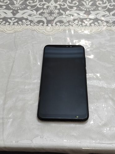 телефон fly cirrus 11: Xiaomi Redmi Note 6 Pro, 32 ГБ, цвет - Черный, 
 Сенсорный, Отпечаток пальца, Две SIM карты