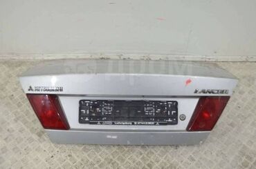фит багаж: Крышка багажника Nissan 2001 г., Б/у, цвет - Серебристый,Оригинал