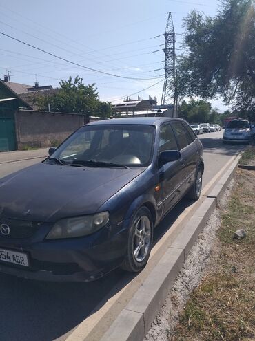 Mazda: Mazda 323: 2002 г., 1.6 л, Механика, Бензин, Хэтчбэк