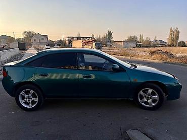 баткенге жардам: Mazda 323: 1995 г., 1.8 л, Кол менен иштөөчү, Бензин, Седан — 5