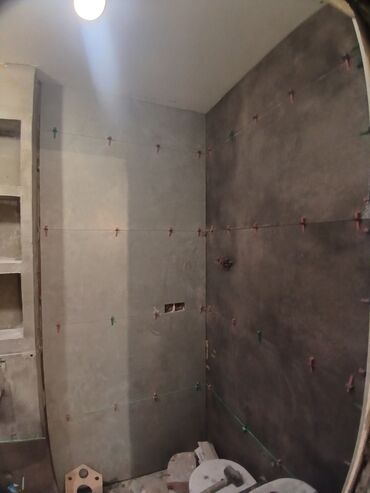 Plitə işləri: Xidmət: Hamam/Tualet kafel-metlax və niş qurulması Təsvir: - — 10