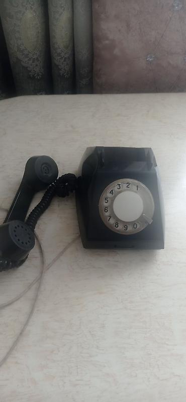 simli: Məhsul: Mexaniki diskli stolüstü telefon Təsvir: - Klassik dizaynlı — 2