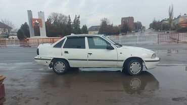 купить новый двигатель дэу нексия 1.5 8 клапанов: Daewoo Nexia, белый седан. Основные характеристики по фото: - Кузов