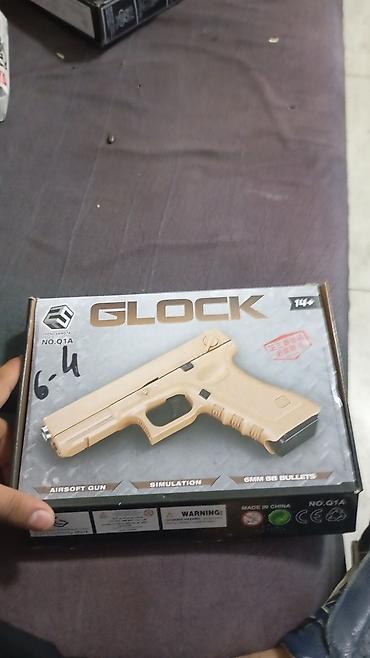 kicik qara don: Məhsul: Airsoft tapança (6 mm BB) Təsvir: - Qutu üzərində “GLOCK” — 3