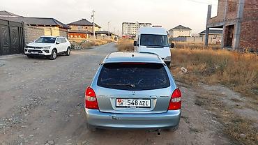 мазда mvp: Mazda 323: 2001 г., 1.6 л, Механика, Бензин, Универсал — 4