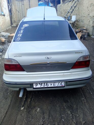 купить двигатель д 245: Автомобиль Daewoo Nexia в кузове седан, окрашенный в светло-серый