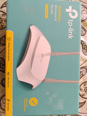 adsl modem купить: TP-Link TL-WR840N modeli 300 Mbps simsiz N routeri ev və ya ofis