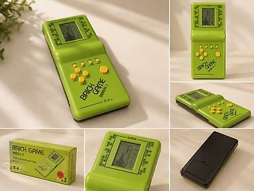 çoxlu oyun: BRICK GAME “9999 in 1” portativ əl oyun konsolu (model E-4) - Korpus — 1
