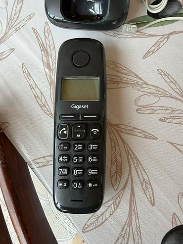 simsiz adapter: Gigaset simsiz ev telefonu dəsti Xüsusiyyətlər: - DECT simsiz boru və — 2