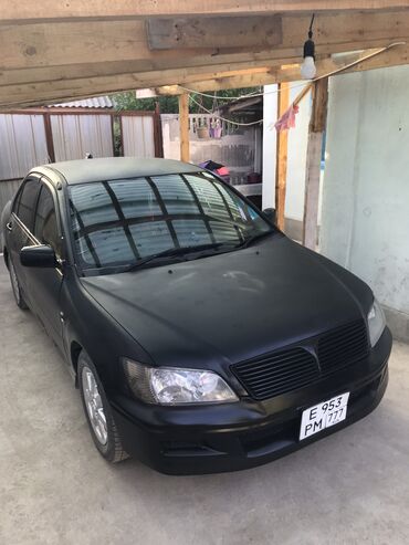 Mitsubishi: Mitsubishi Lancer: 2001 г., 1.5 л, Вариатор, Бензин, Седан