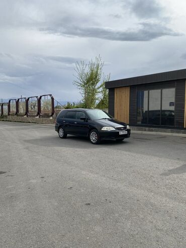 honda odyssey продажа: Чёрный минивэн Honda Odyssey, удобный и практичный автомобиль для