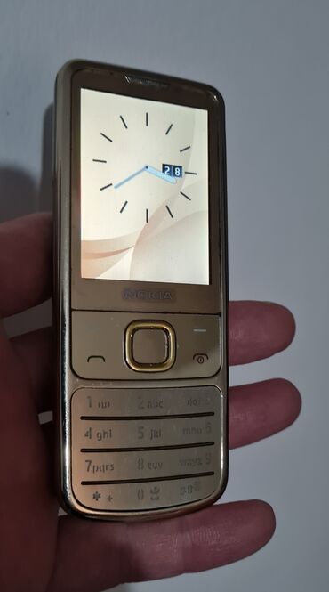 nokia 6300 купить: Nokia 6700 Slide, Б/у, цвет - Золотой, 1 SIM