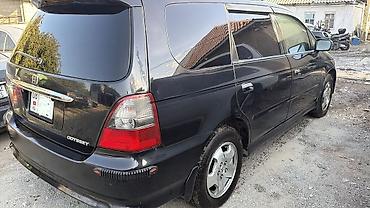 70 сом: 🚗 ПРОДАЮ HONDA ODYSSEY 📅 2000 год 🎨 Цвет: чёрный ⛽ Двигатель: 2.3 л — 6
