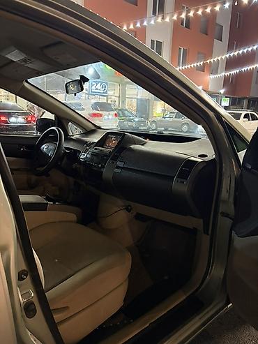 nolyeddi şəkilləri: Toyota Prius (2-ci nəsil) hibrid hetçbek - Gümüş/boz rəngli kuzov, 5 — 6