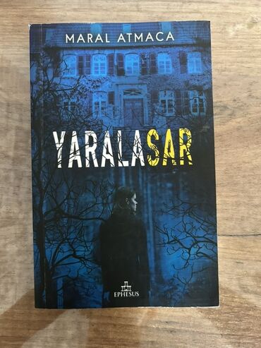 Maral Atmaca tərəfindən yazılmış "Yaralasar" adlı bu kitab oxucunu