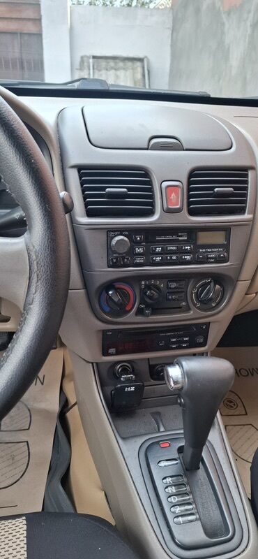 Nissan: Nissan Sunny sedan – geniş salonlu, komfortlu şəhər və uzun yol — 10