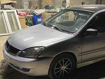 kia 2014: Mitsubishi Lancer: 2004 г., 1.6 л, Автомат, Бензин, Седан — 2
