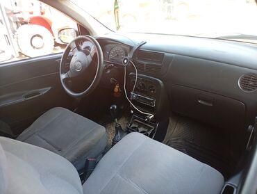 арзан машина мерс: Daihatsu Cuore: 2004 г., 0.9 л, Механика, Бензин, Хетчбек